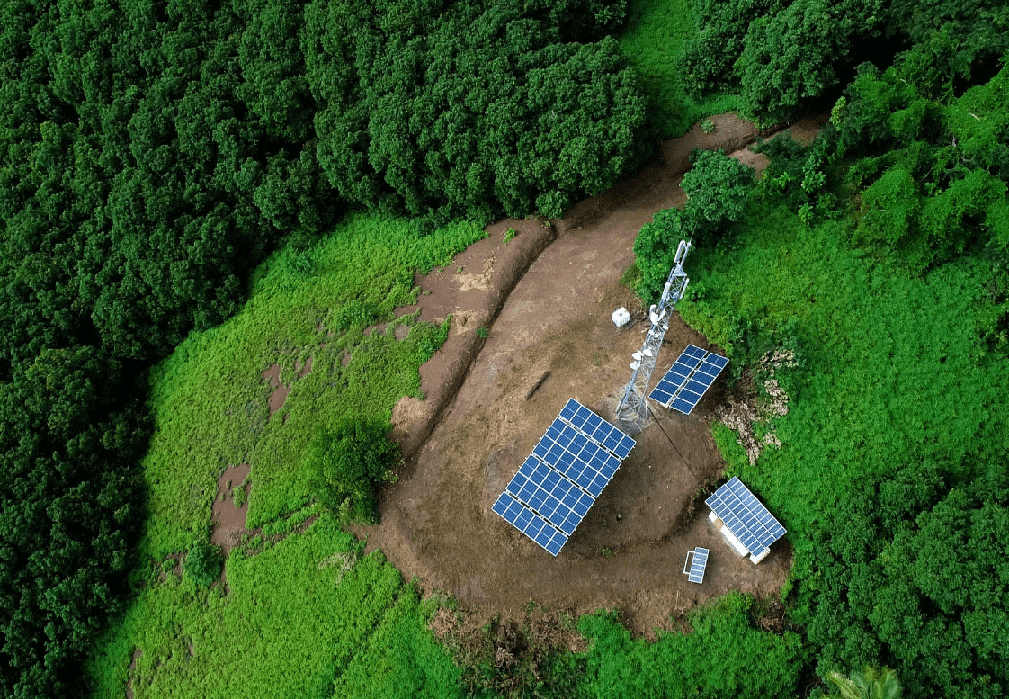 Remote Telecom Site with solar panels installed onsite and a lattice Antenna